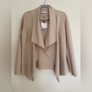 Shawl collar cardigan.